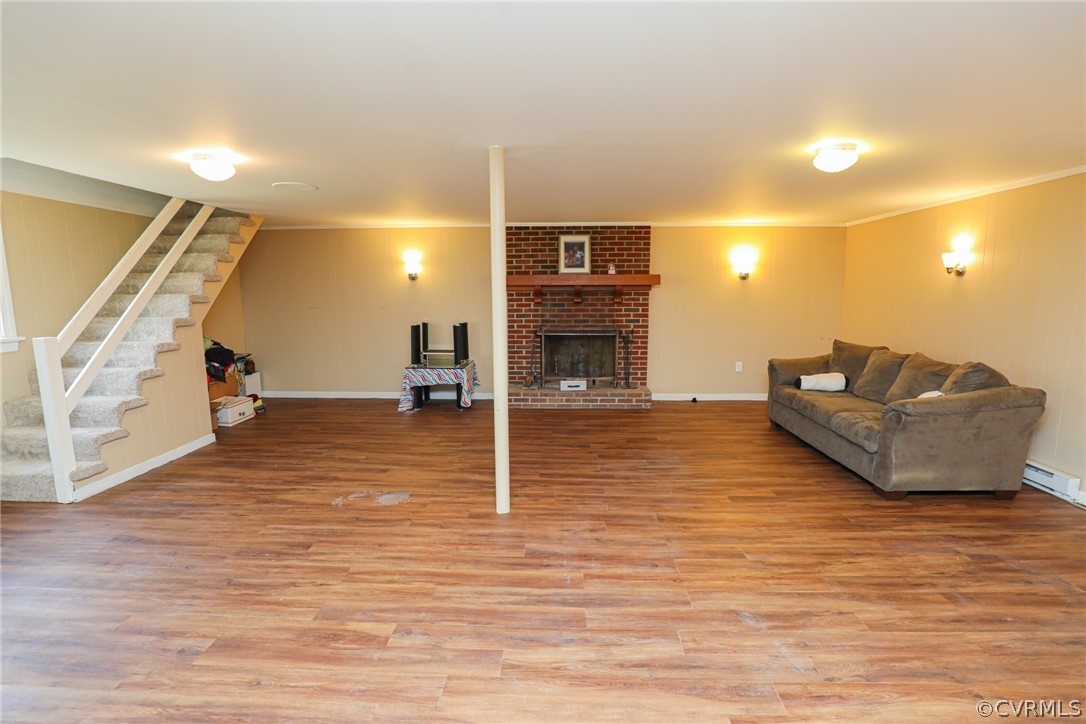 5346 Cold Harbor Road Mechanicsville, VA 23111 - Photo 28 of 42 Rec Rm with laminate floor, wood burning fireplace
