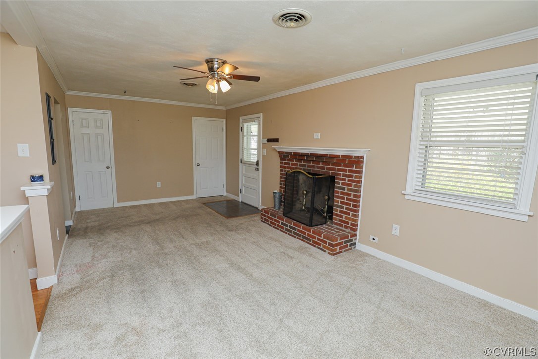 5346 Cold Harbor Road Mechanicsville, VA 23111 - Photo 8 of 42 Family Room with fireplace, ceiling fan, and crown