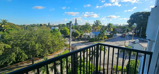 a view of a balcony with an outdoor space