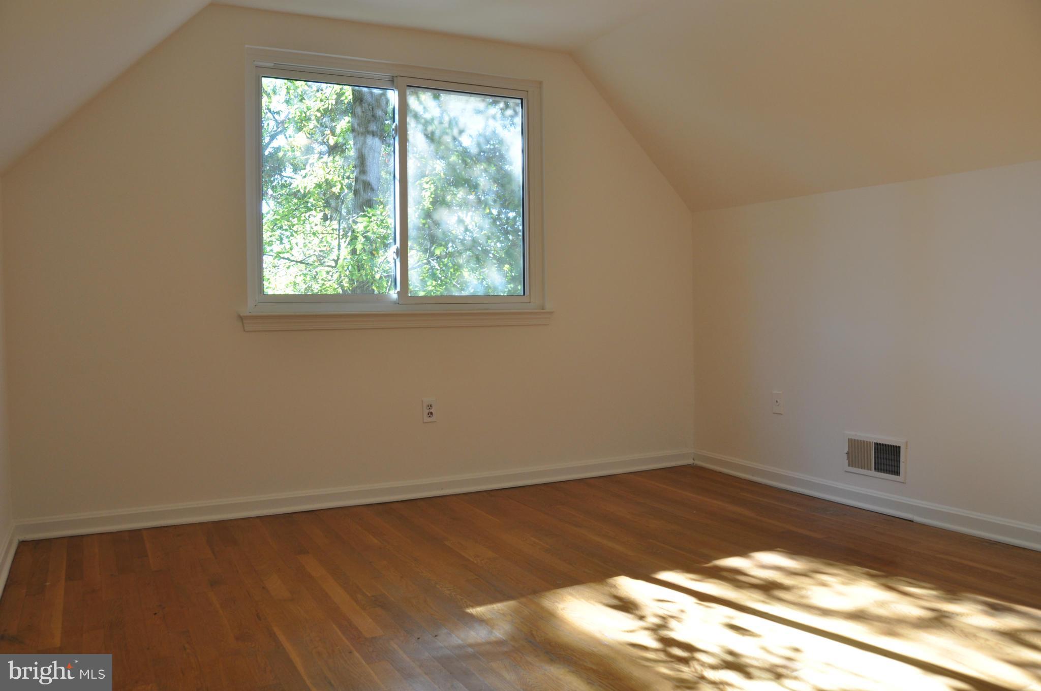 5417 Rolling Road Springfield, VA 22151 - Photo 7 of 20 a view of a window in an empty room