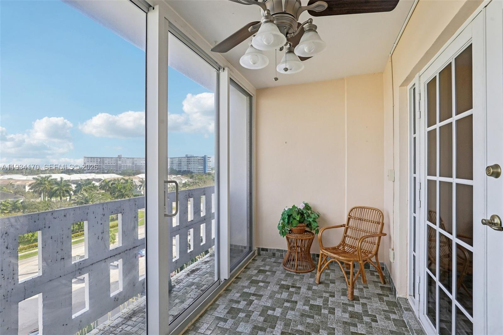 4350 Hillcrest Drive, Unit 702 Hollywood, FL 33021 - Photo 24 of 29 a view of a balcony with furniture