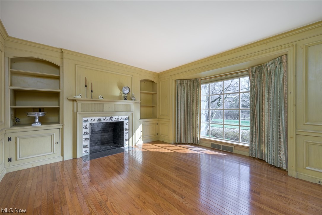 3030 Roundwood Road Hunting Valley, OH 44022 - Photo 23 of 35 Large light filled library with fireplace