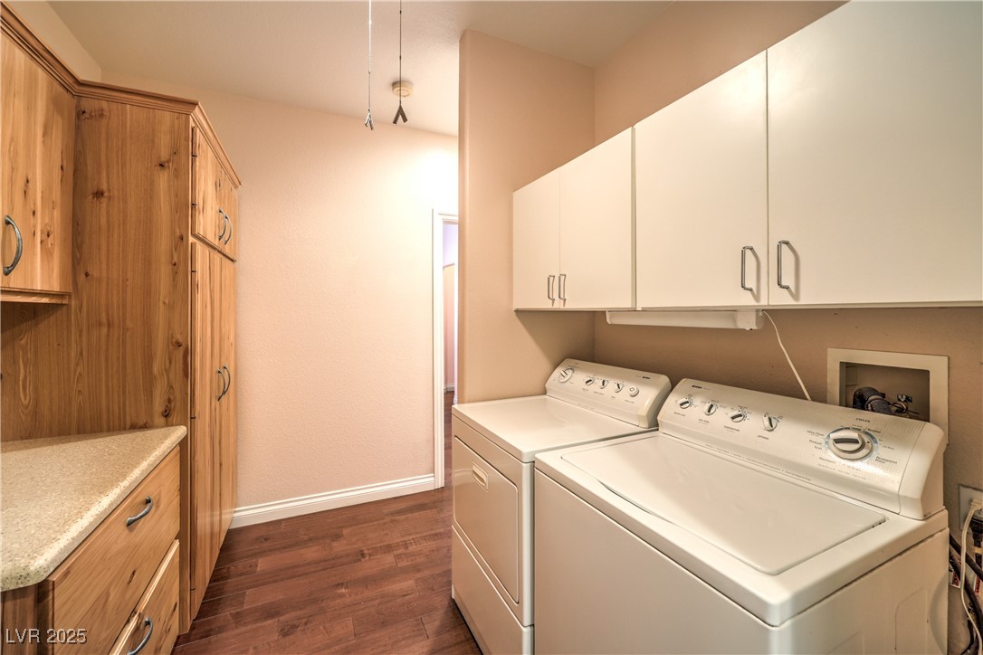 3910 West Pebble Road Las Vegas, NV 89139 - Photo 38 of 59 Guest house Laundry area, cabinet space, and washer and clothes dryer