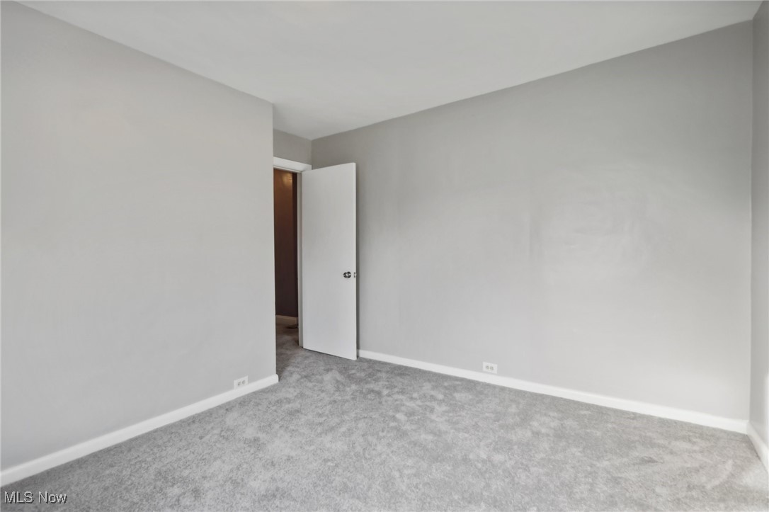 311 Warren Road Newton Falls, OH 44444 - Photo 21 of 30 View of carpeted empty room