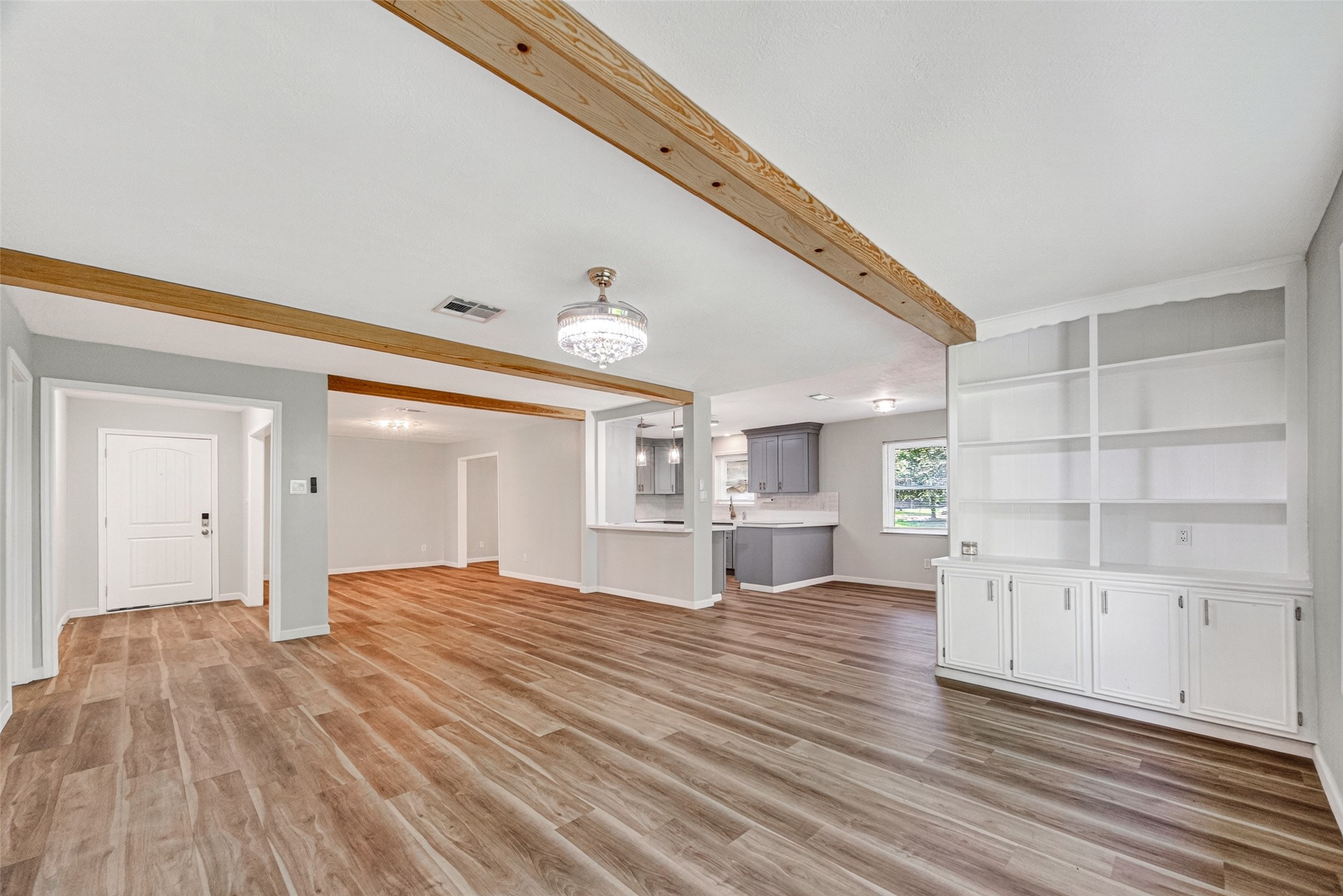 25503 Foxbriar Lane Spring, TX 77373 - Photo 21 of 45 a view of a kitchen with wooden floor and windows