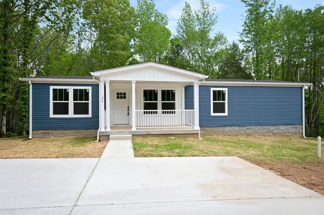 a view of a house with a swimming pool