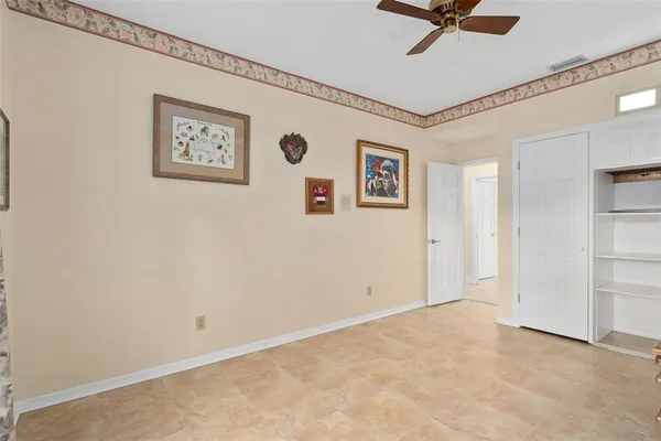 a view of a livingroom with a ceiling fan