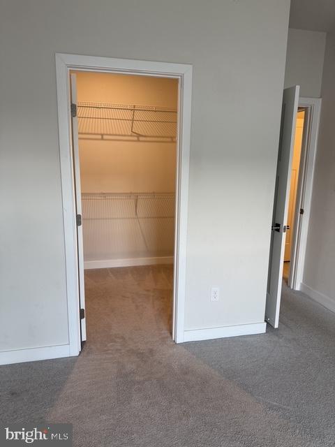 711 Quarry Point Road Malvern, PA 19355 - Photo 23 of 26 an empty room with windows and closet