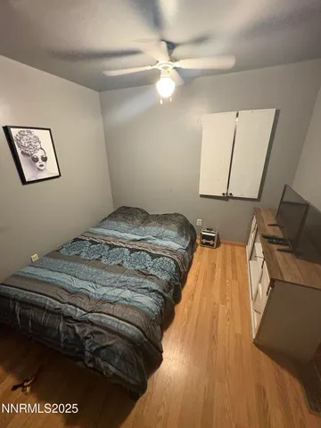 a bathroom with a sink and mirror with painted walls