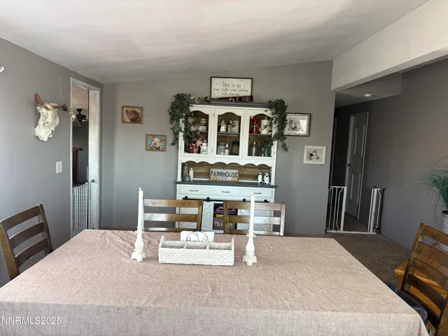 a bedroom with a bed and a table in it