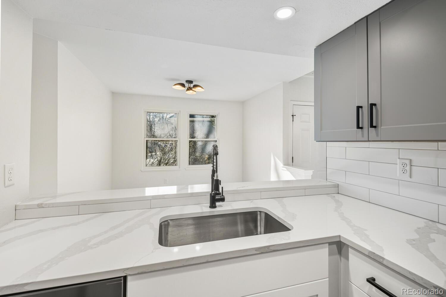 9041 Zephyr Court Broomfield, CO 80021 - Photo 19 of 35 a close view of sink and tap