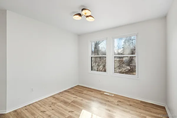 an empty room with windows