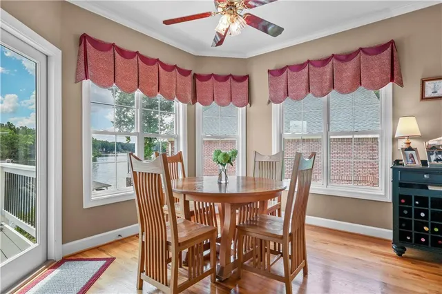 a view of bedroom with furniture and wooden floor