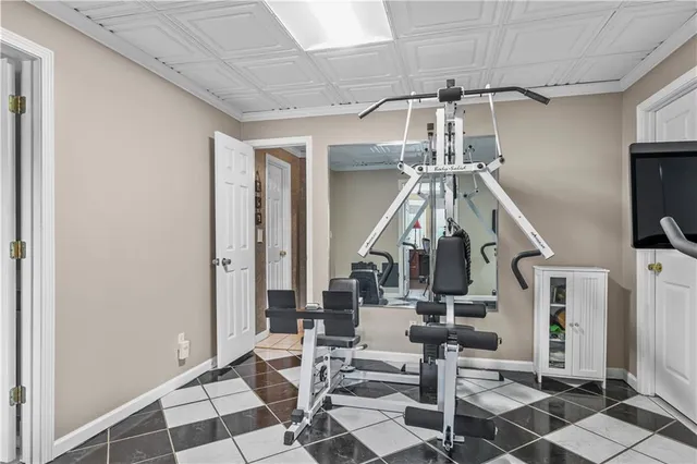 a view of a lake with boats and trees in the background