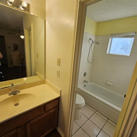 a bathroom with a sink and a tub