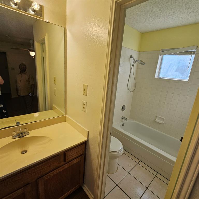 4951 Regal Bluff Mesquite, TX 75150 - Photo 10 of 11 a bathroom with a sink and a tub