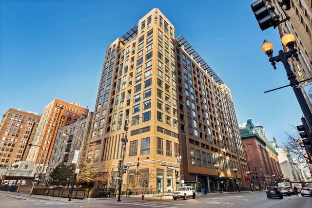 520 South State Street, Unit 711 Chicago, IL 60605 - Photo 1 of 28 a view of a tall building next to a road