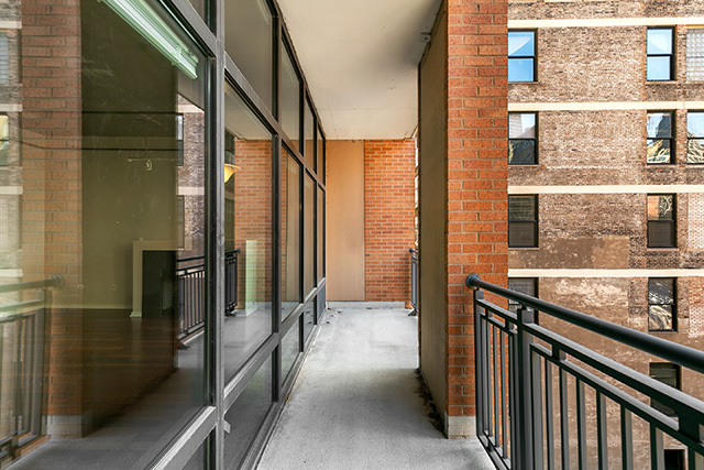 520 South State Street, Unit 711 Chicago, IL 60605 - Photo 14 of 28 a view of a balcony and car parked