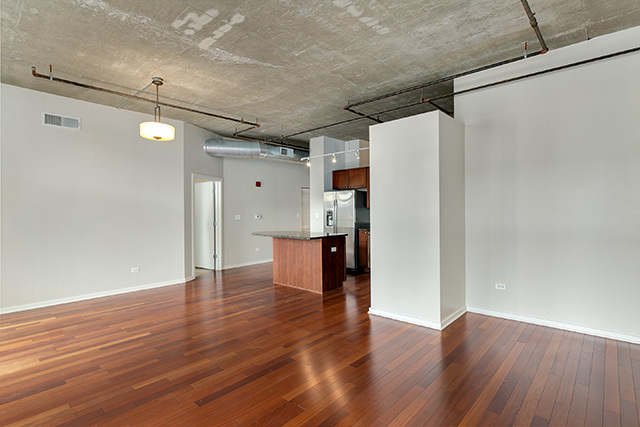 520 South State Street, Unit 711 Chicago, IL 60605 - Photo 7 of 28 a view of empty room with wooden floor and window