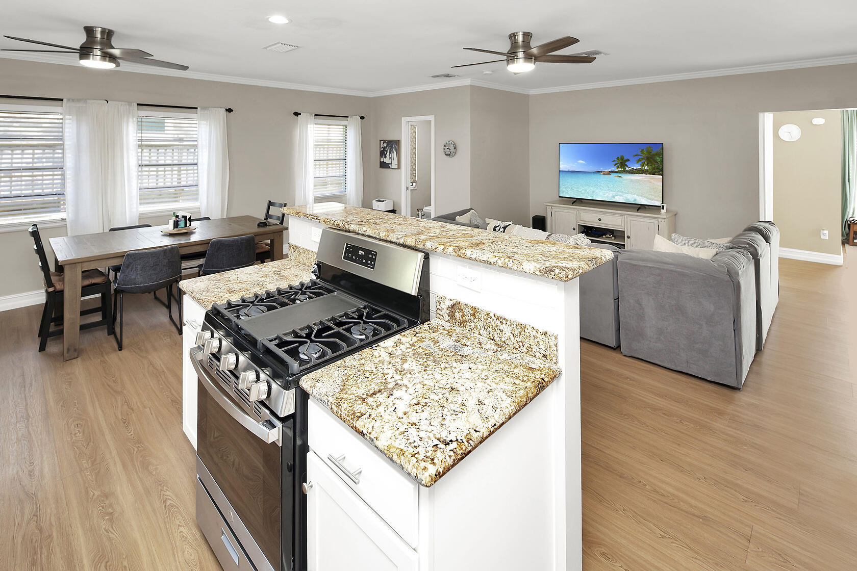 1632 Bogie Drive Big Pine Key, FL 33043 - Photo 17 of 47 a living room with furniture and a wooden floor