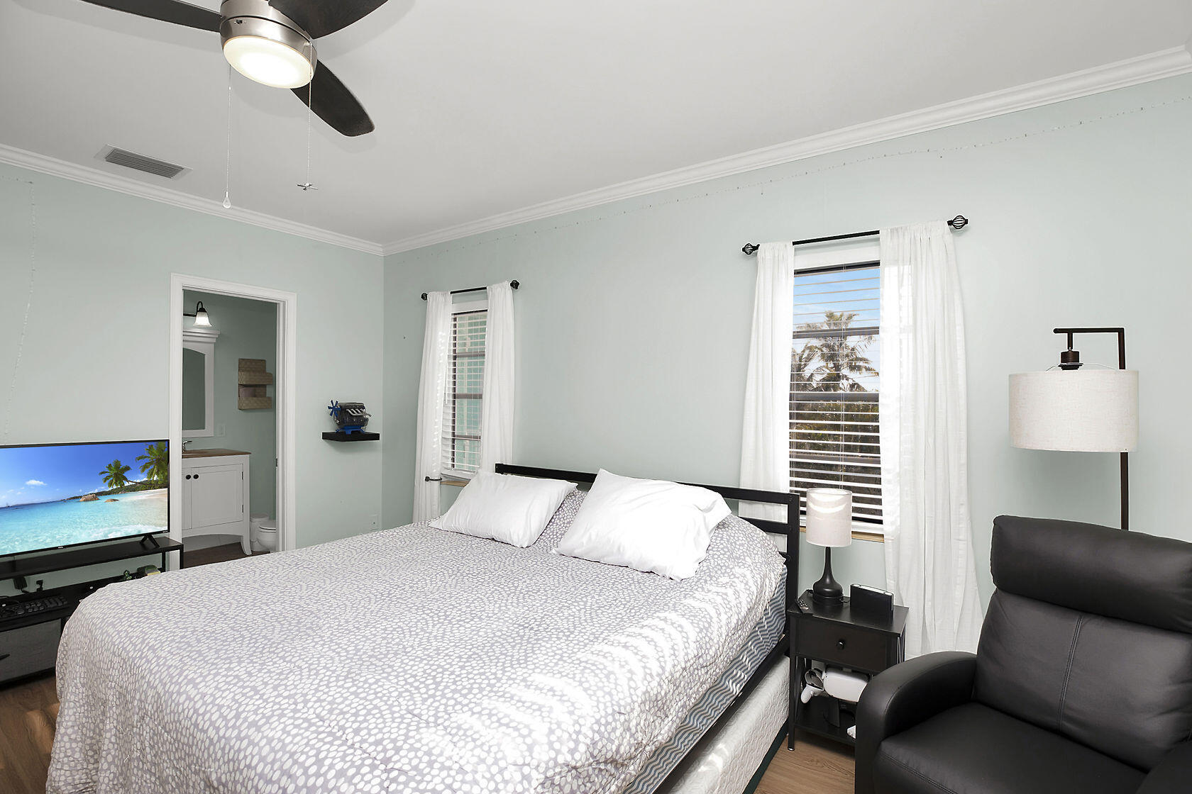 1632 Bogie Drive Big Pine Key, FL 33043 - Photo 20 of 47 a bedroom with a bed couch and window