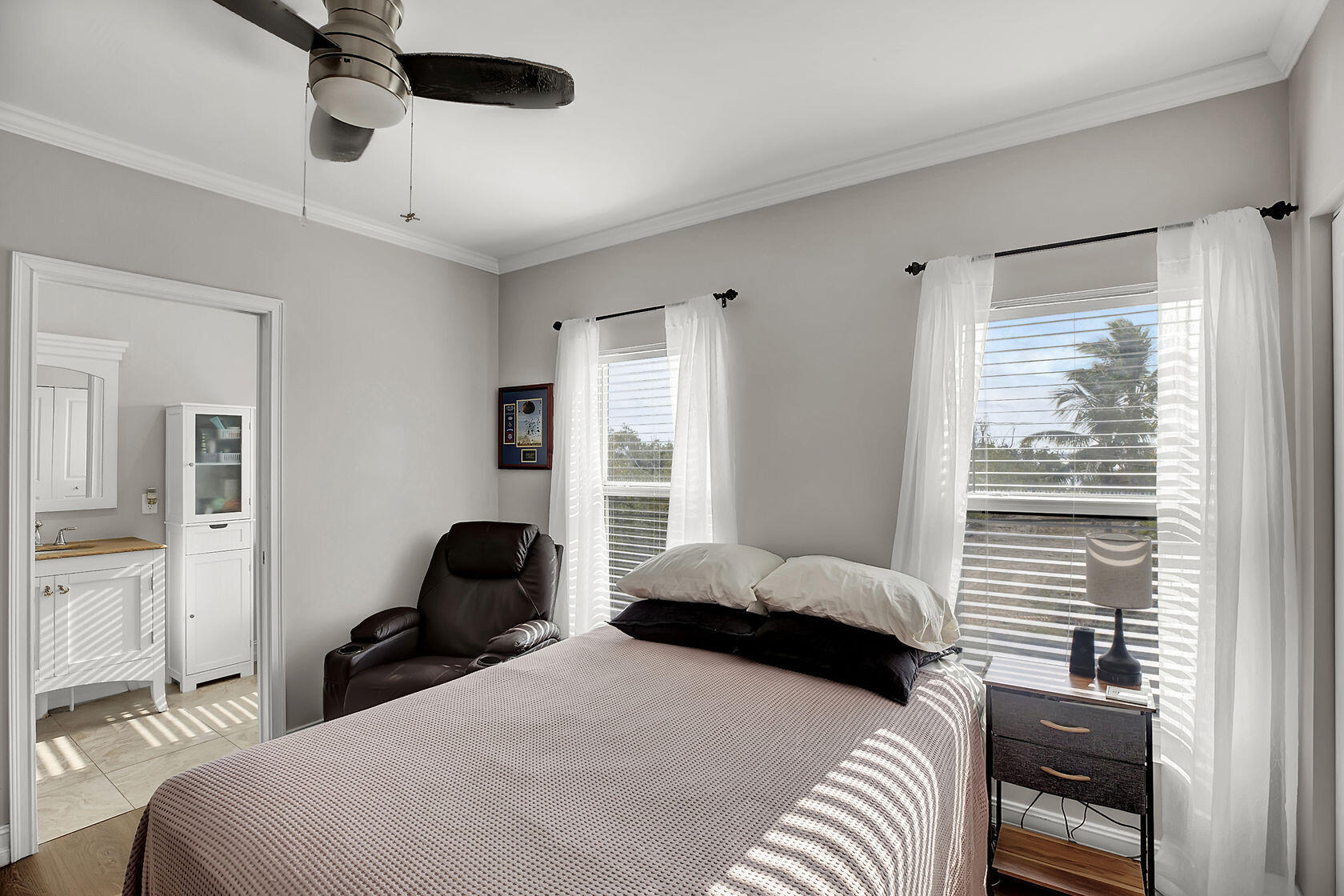 1632 Bogie Drive Big Pine Key, FL 33043 - Photo 24 of 47 a bedroom with a bed and window