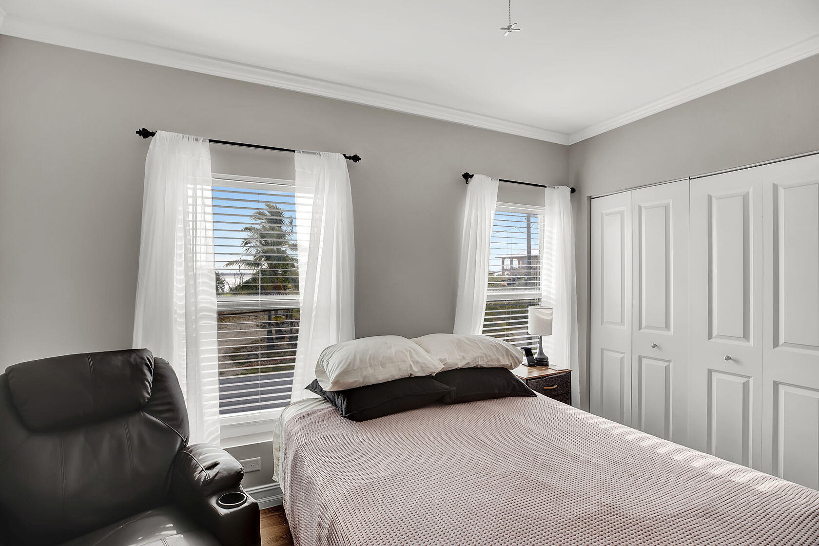 1632 Bogie Drive Big Pine Key, FL 33043 - Photo 25 of 47 a bedroom with a bed and a window