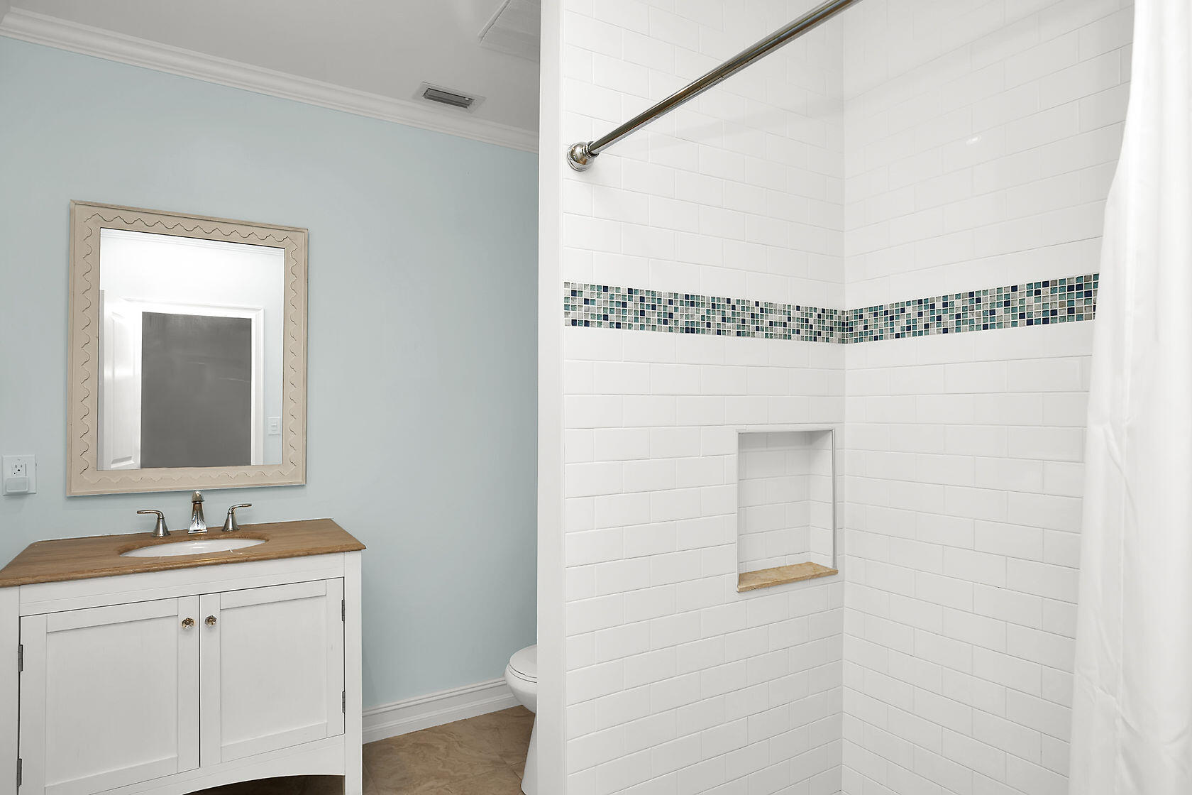 1632 Bogie Drive Big Pine Key, FL 33043 - Photo 31 of 47 a bathroom with a sink and a mirror