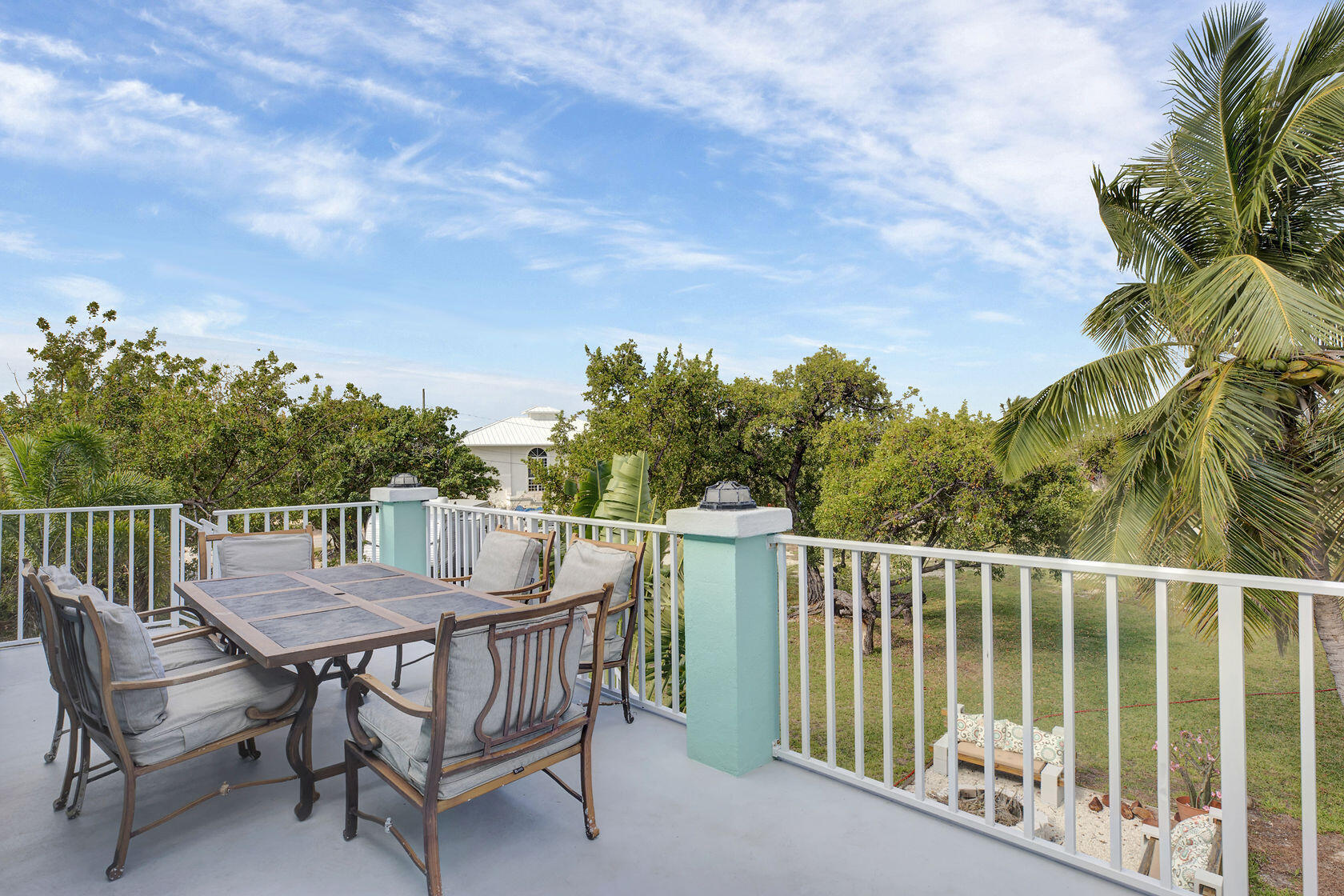 1632 Bogie Drive Big Pine Key, FL 33043 - Photo 34 of 47 a view of a chairs and table on the roof deck