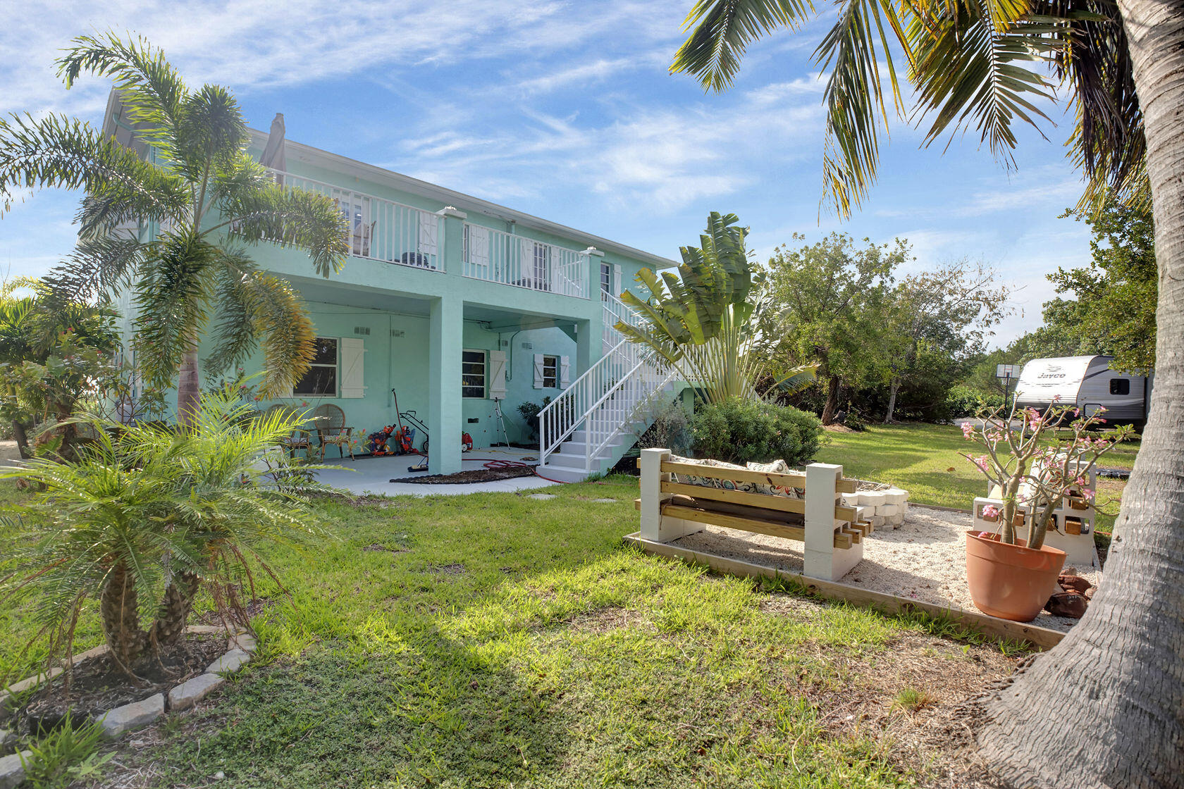 1632 Bogie Drive Big Pine Key, FL 33043 - Photo 42 of 47 a view of a house with backyard and sitting area