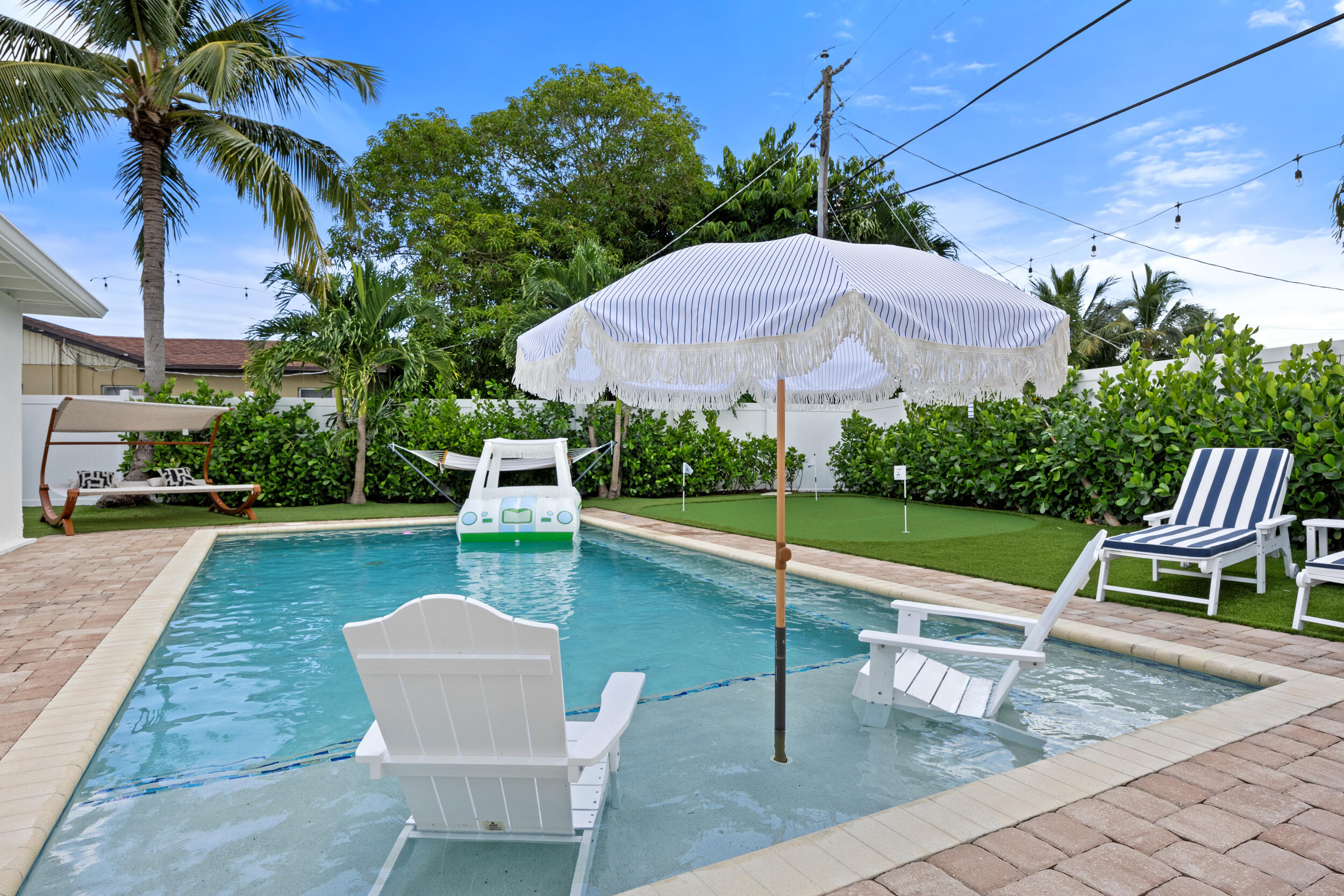 1096 Southwest 27th Avenue Boynton Beach, FL 33426 - Photo 14 of 21 a garden view with a seating space