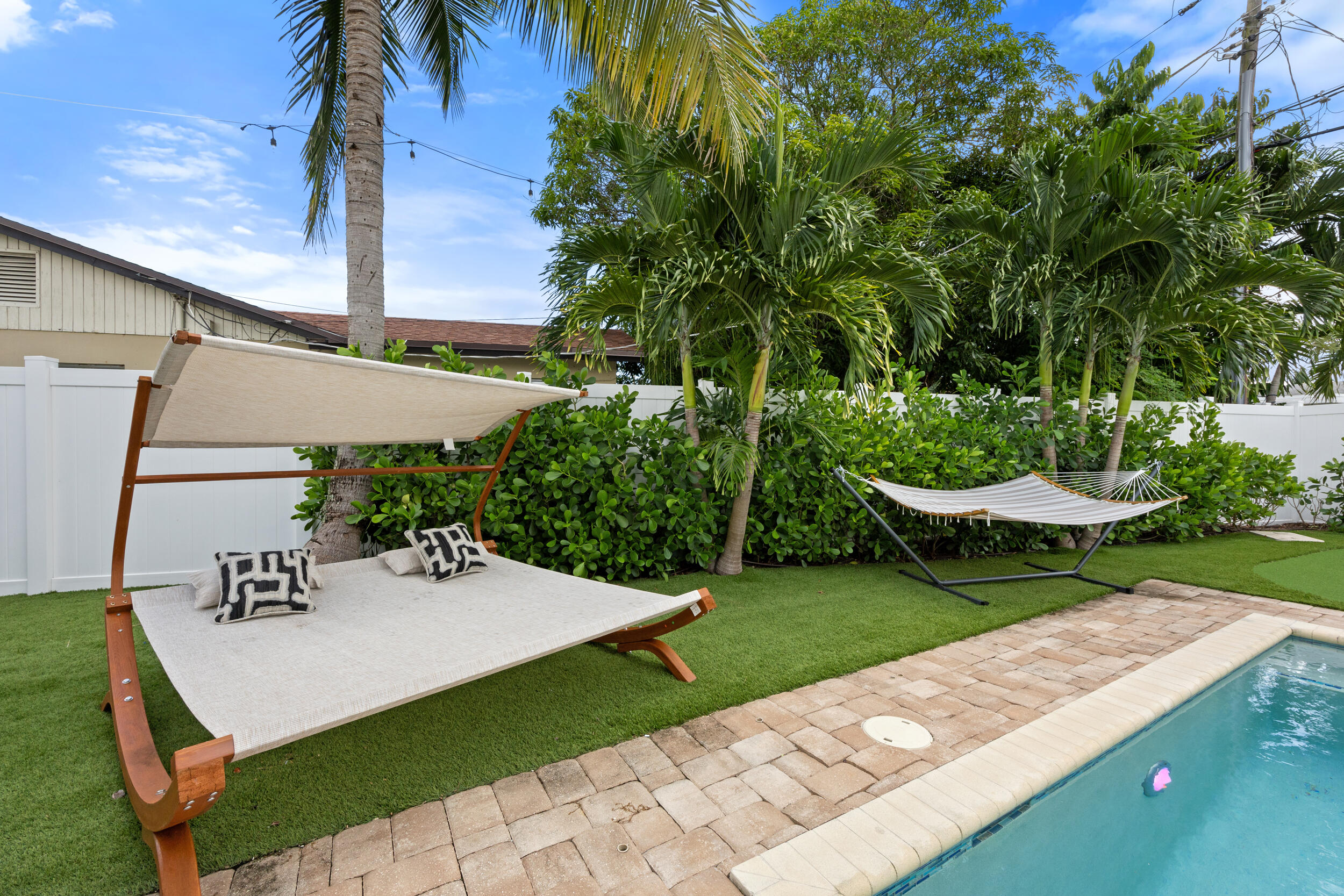 1096 Southwest 27th Avenue Boynton Beach, FL 33426 - Photo 15 of 21 a view of a backyard with sitting area