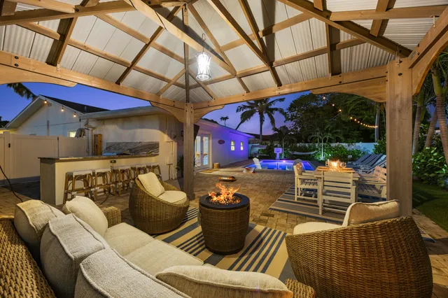 a view of a chairs and tables in patio