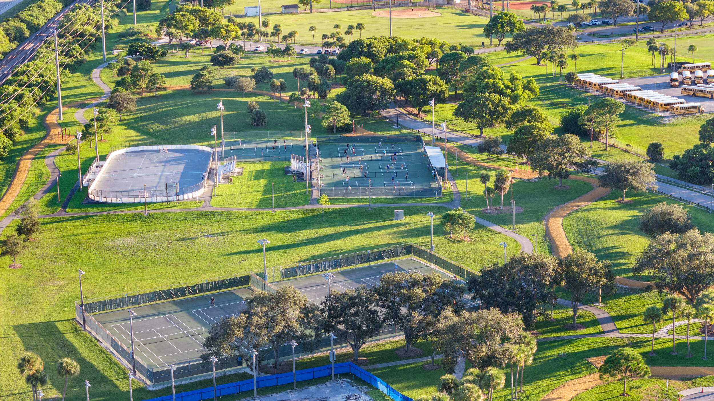 1096 Southwest 27th Avenue Boynton Beach, FL 33426 - Photo 20 of 21 a view of a pool with a garden