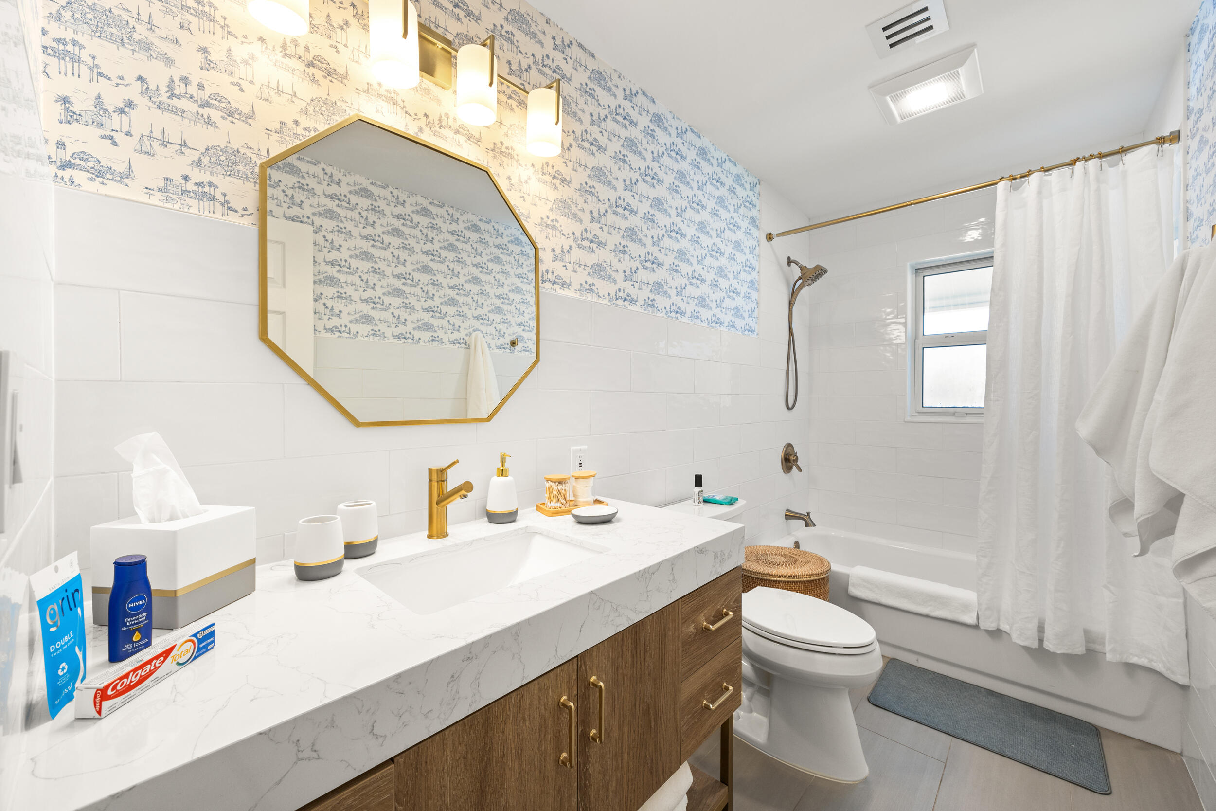 1096 Southwest 27th Avenue Boynton Beach, FL 33426 - Photo 10 of 21 a bathroom with a sink toilet and shower