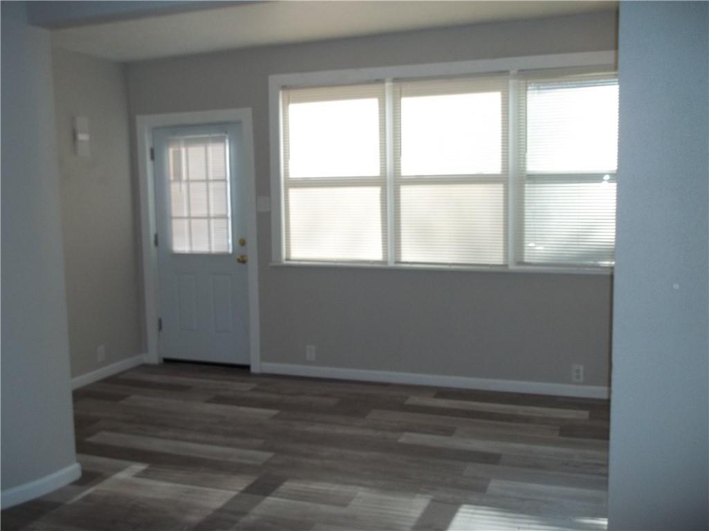 3840 Baytree Street Pittsburgh, PA 15214 - Photo 2 of 21 a room that has a window in it