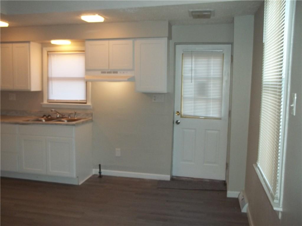 3840 Baytree Street Pittsburgh, PA 15214 - Photo 10 of 21 a view of empty room with wooden floor and fan