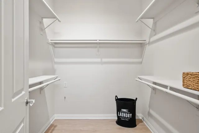 a view of a hallway with front door