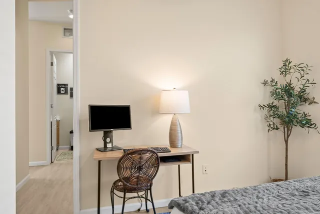 a view of a workspace with furniture