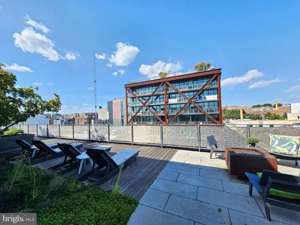 a view of a terrace with sitting area