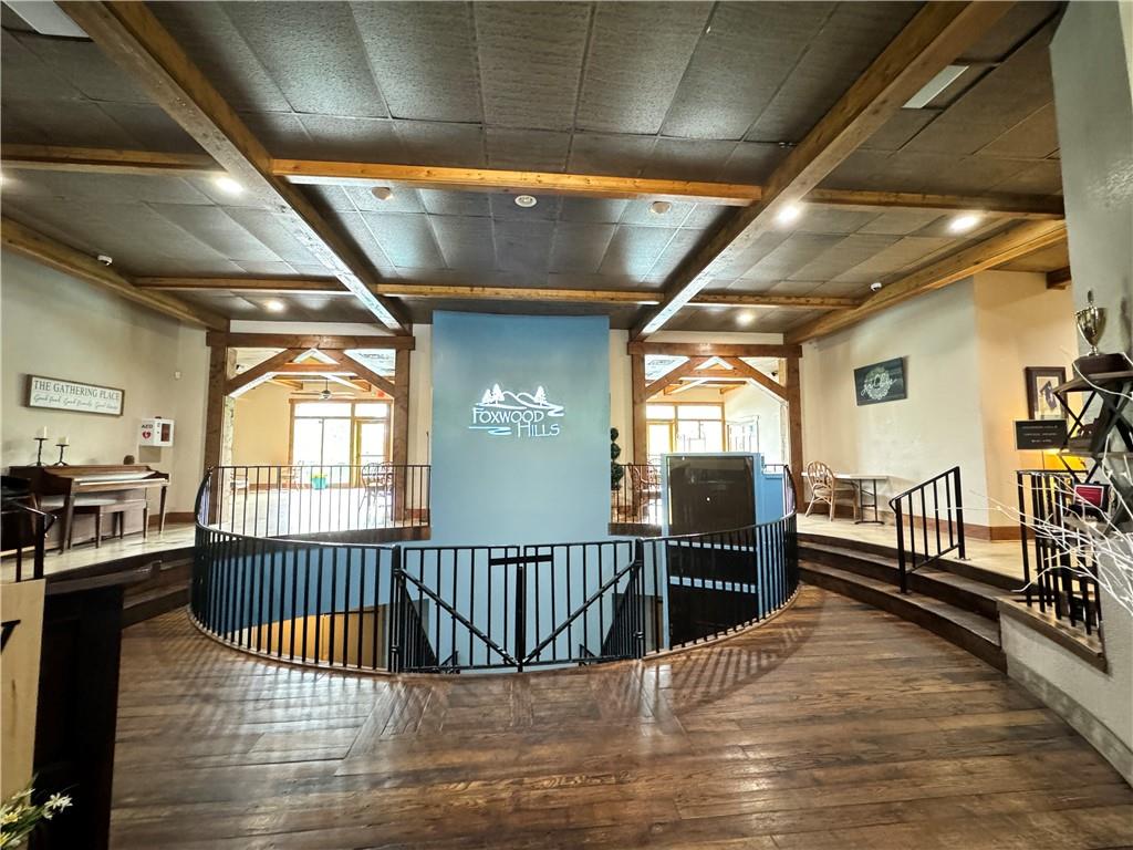 129 Middleton Drive Westminster, SC 29693 - Photo 5 of 12 This spacious interior offers an inviting atmosphere with natural wood accents and abundant lighting.