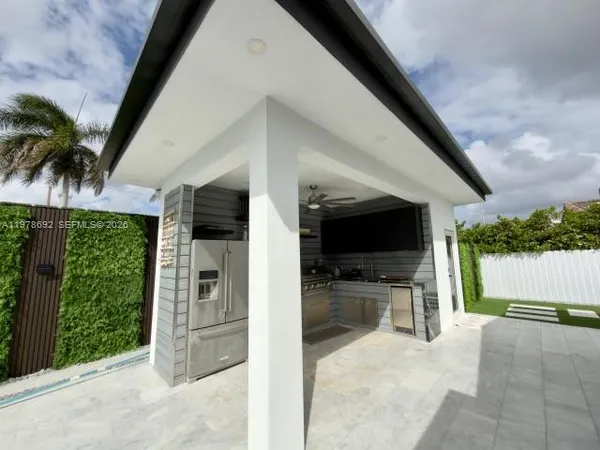 a bathroom with a bathtub and shower