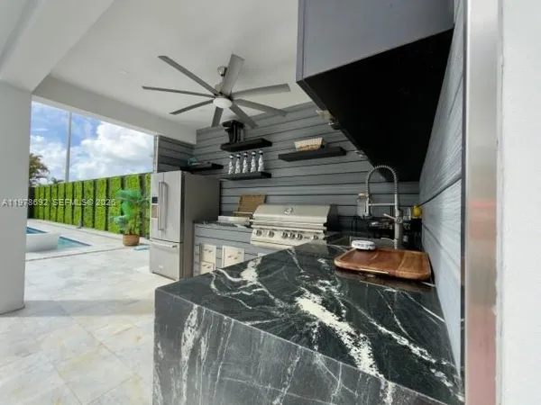 a bed room with a bed and a window