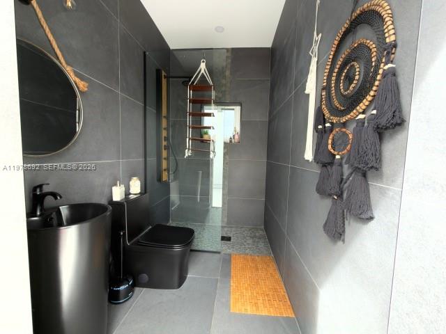 9351 Southwest 88th Terrace Miami, FL 33176 - Photo 24 of 73 a bathroom with a bathtub and shower