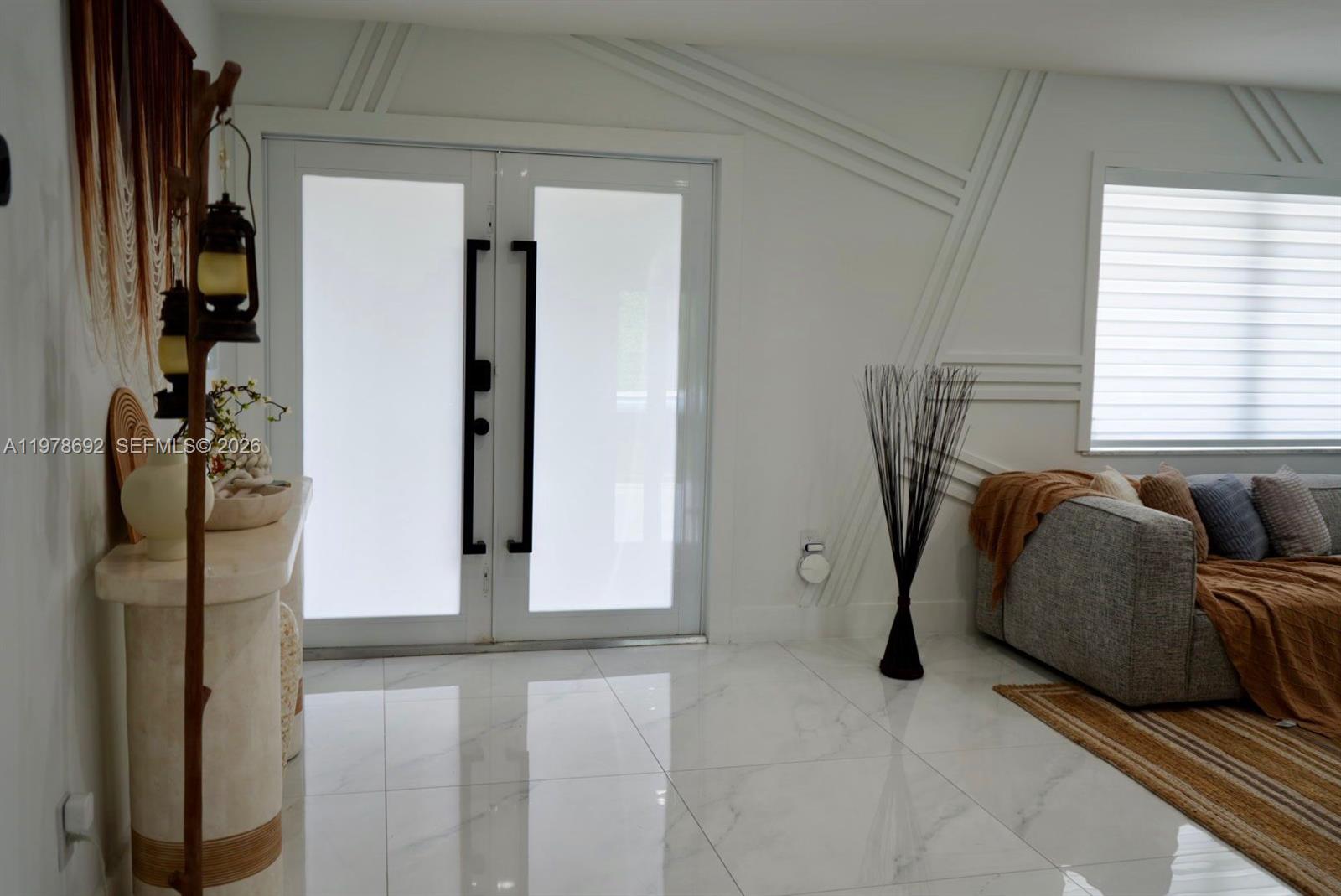 9351 Southwest 88th Terrace Miami, FL 33176 - Photo 25 of 73 a bed room with a bed and a window