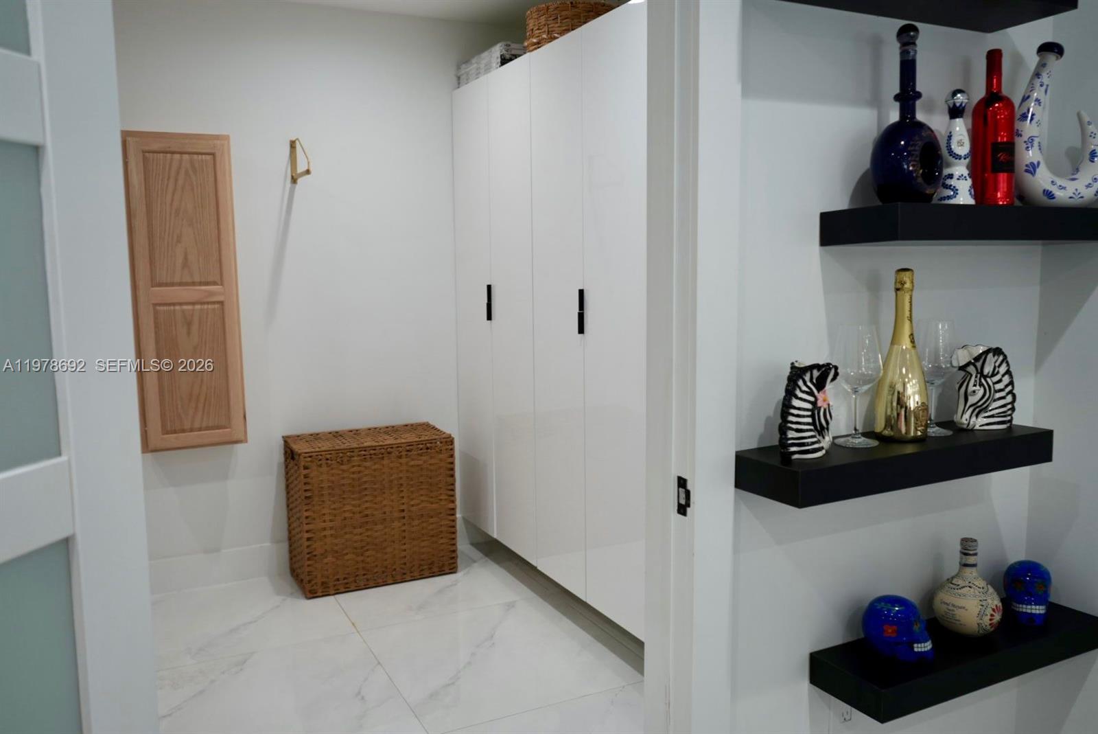 9351 Southwest 88th Terrace Miami, FL 33176 - Photo 32 of 73 a room with storage and utility