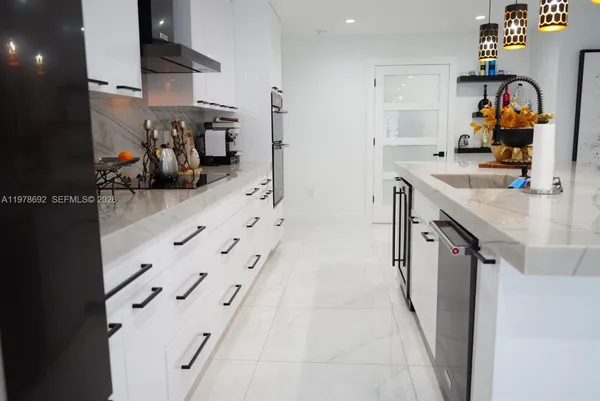 a bathroom with a sink and toilet