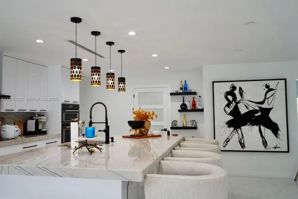 a bathroom with a toilet a sink and a mirror