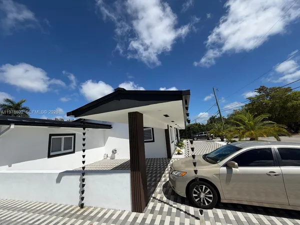 a view of swimming pool with a patio