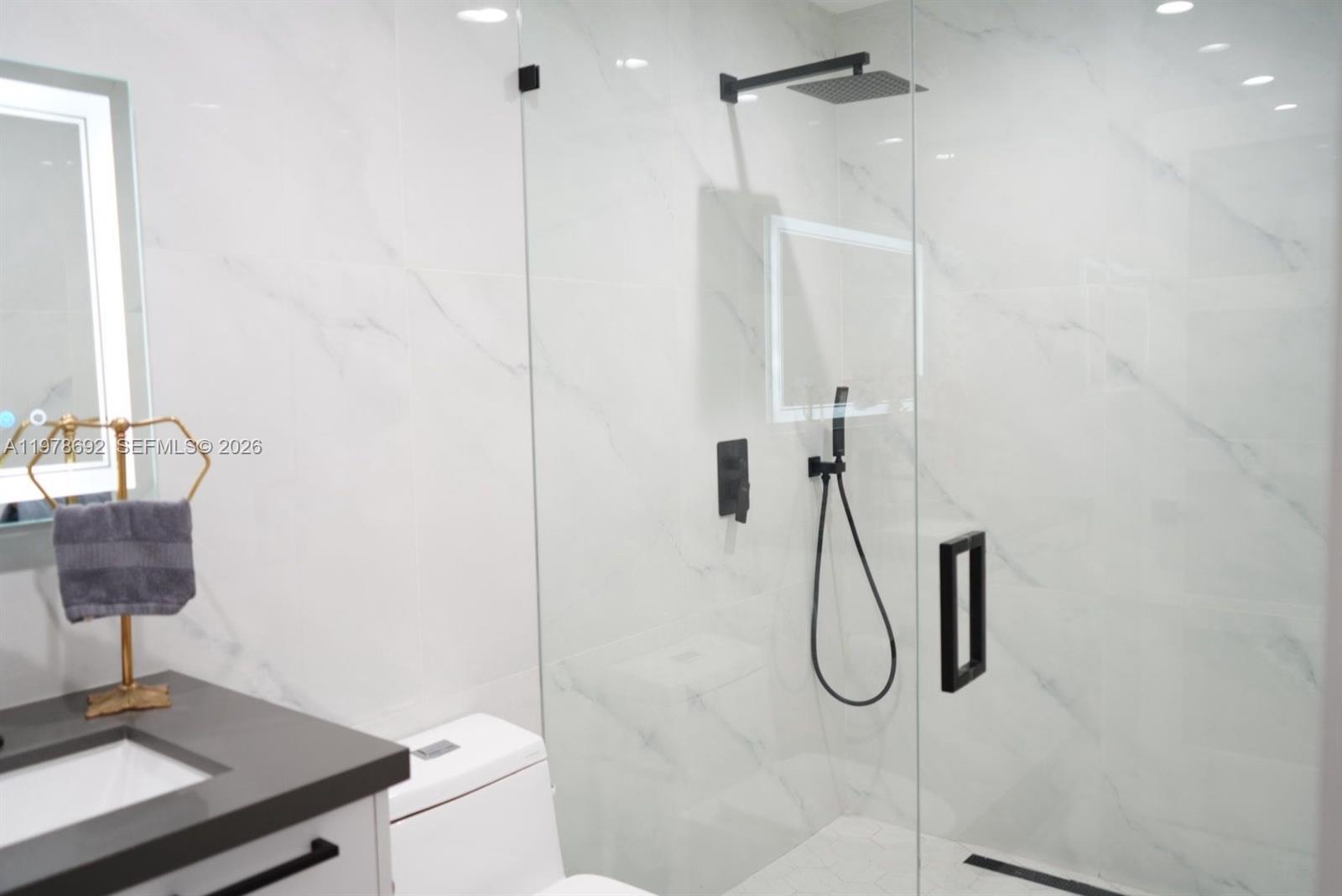 9351 Southwest 88th Terrace Miami, FL 33176 - Photo 47 of 73 a bathroom with a shower